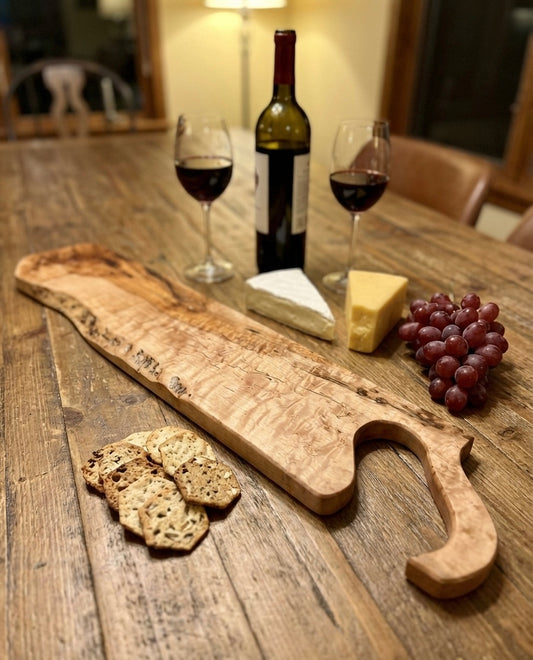 Birdseye maple ‘saw handle’ charcuterie/serving/cutting board.